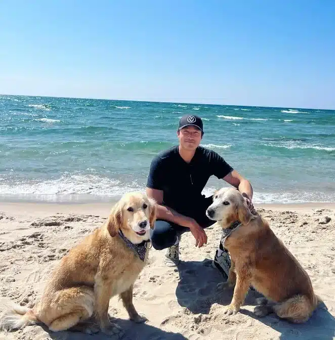 portrait-of-Actor-Daniel-Henney-with-two-dogs-on-the-beach