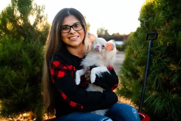 woman-holding-puppy-called-lucky